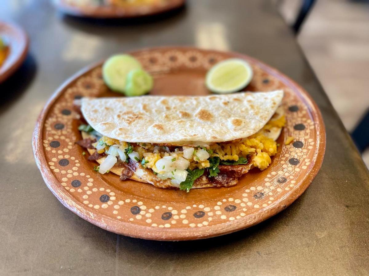 Savory Birria tacos with dipping consomé and Mexican torta